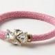 Pink wedding bracelet with shining crystal