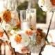 Centerpieces with white and orange roses