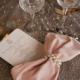Elegant Wedding Tablescape ♥ Pink Bow Tie Napkins, Lace and Pearl Tablecloth, and Pearl Napkin Rings Wedding Centerpiece 