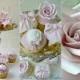 Roses, bow and cameo cupcakes
