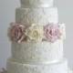 Wedding cake with lace & ivory and amnesia roses