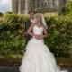 Bride and groom in front of Arundel Castle