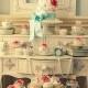2 tier wedding cake with turquoise ribbon