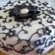 Decorating A Cake - Pink With Black Blossoms