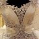 Ivory wedding dress carved with crystals