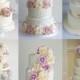 Ivory wedding cakes decorated with roses
