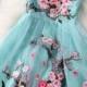 Turquoise bridesmaid dress decorated with flowers