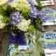 Blue and white wedding tablescape with green apples