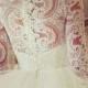 Ivory wedding dress with heavy floral patterns