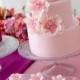 Classic pink wedding cake with flowers