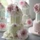 Colorful wedding cakes decorated with pink roses