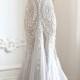 Mermaid style white wedding gown with beads