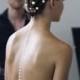 A Line Of Pearls Down The Back At Chanel 