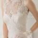 Ivory wedding dress with floral laces
