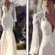 White wedding gown with bead work at top