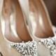 Ivory souliers decorated with butterfly crystals