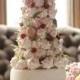 Tower like wedding cake decorated with cherries