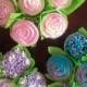 Wedding cupcakes with flowers and leaves