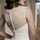 Ivory chiffon wedding dress with transparent back