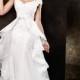 Elegant long white lacy wedding gown