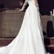 White wedding gown with transparent sleeves