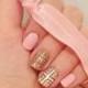 Nail Art. Pink   Gold Manicure 