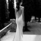 Low back white wedding dress with beaded line