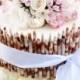 White wedding cake with chocolate curls