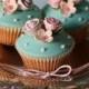 Beautiful Cupcakes with pink blossoms on the top