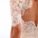 Wedding gown with the beautiful flower pattern at the back.
