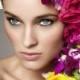 Makeup with wonderful hairstyle made up of blossoms.