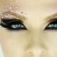 Eye makeup art using crystals and rhinestones