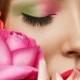 Makeup with pink and green colored eye shadow.