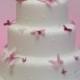 Gâteau de mariage de papillon rose