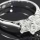 18k White Gold "Trellis" 3 Stone Engagement Ring (0.50ctw ACA Side Stones Included)