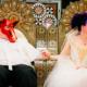Bow at the throne of a rainbow-colored masquerade wedding