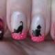 Nail art: Marbled nails with cats and flowers