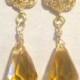 Belle Luxe Earrings- Gold Rose Earrings With Golden Yellow Faceted Teardrop Crystal.