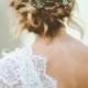 Twisted Low Bun With Flower Crown - A Twisted Low Bun Wedding Hairstyle With Flower Crown