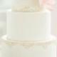 Elegant White Cake With Gold Piping
