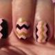 Nail art: Black and gold chevron