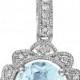 Sky blue topaz & 1/10 carat t.w. diamond sterling silver pendant