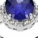 4/5 CT. T.W. Oval Cut Tanzanite and Round Cut CZ Pave Set Bridal Style Ring in Sterling Silver - Silver