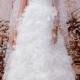 A Floor Length Veil Is Dotted With White Embellishments From The Monique Lhuillier Fall 2014 Bridal Collection.