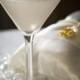 Wedding Cake Martini - 1.5 Oz Vanilla Vodka, 1/2 Oz Malibu® Coconut Rum, 1.5 Oz Pineapple Juice, One Splash Grenadine Sy...