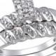 1/10 CT. T.W. Round and Parallel Baguette Diamond Bridal Ring Set in Sterling Silver (GH I2-I3)