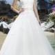 Tulle And Embroidered Lace Ball Gown With A Beaded Flower Satin Belt