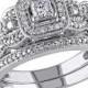 1/2 CT. T.W. Princess Cut and Round Diamond Bridal Ring Set in 14K White Gold (GH I1-I2)