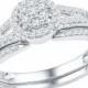 1/4 CT. T.W. Round Diamond Prong Set Flower Bridal Ring in 10K White Gold