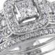 1 1/4 CT. T.W. Princess Cut and Round Diamond Bridal Ring Set in 14K White Gold (GH I1-I2)